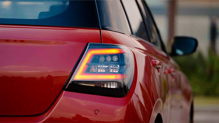 Close-up of the taillight of a Maruti Suzuki Swift