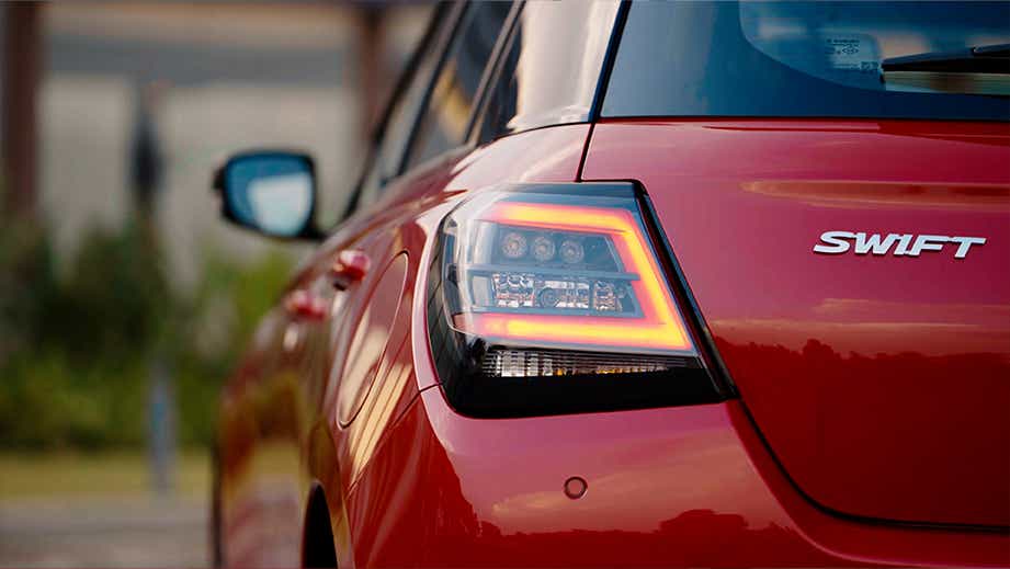 Rear three-quarter view of a Maruti Suzuki Swift