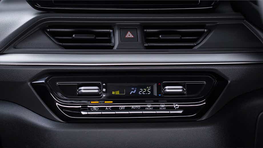 dashboard climate control panel of a Maruti Suzuki Swift