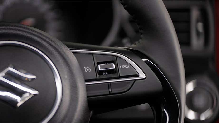 steering wheel controls of a Maruti Suzuki Swift
