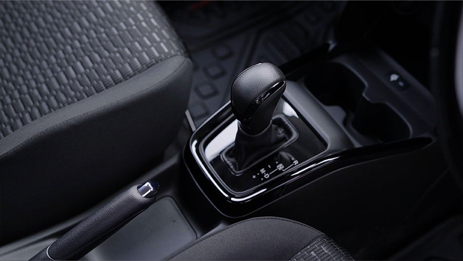 Gear shifter and center console of a Maruti Suzuki Swift