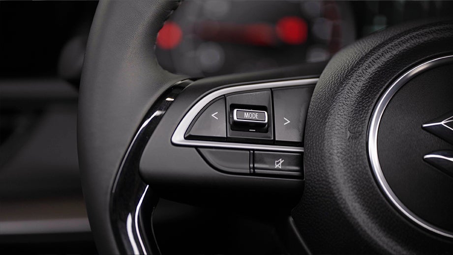 Steering wheel controls of a Maruti Suzuki Swift