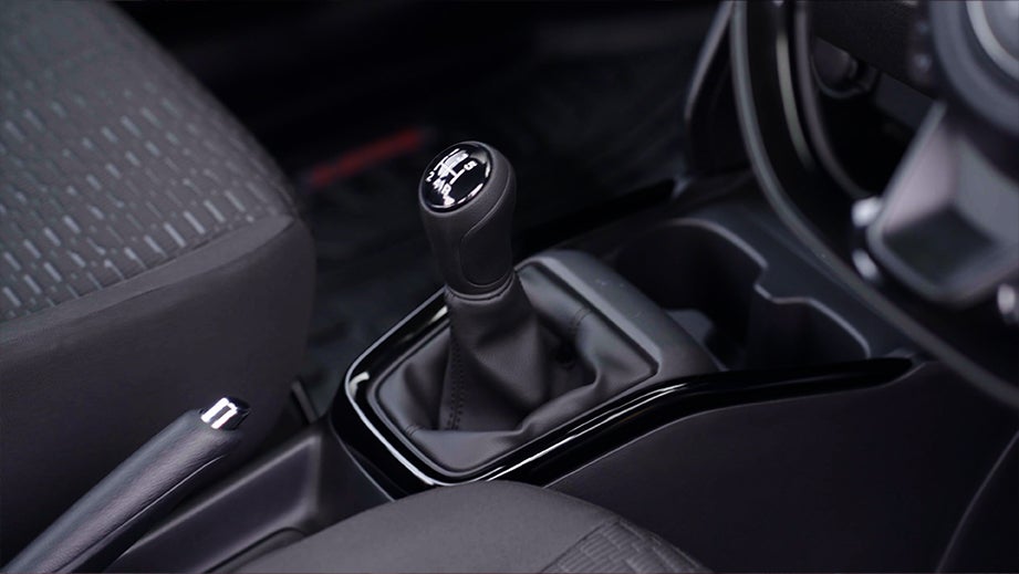gear lever and center console of a Maruti Suzuki Swift