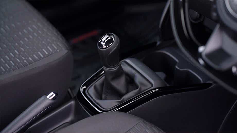 gear lever and center console of a Maruti Suzuki Swift