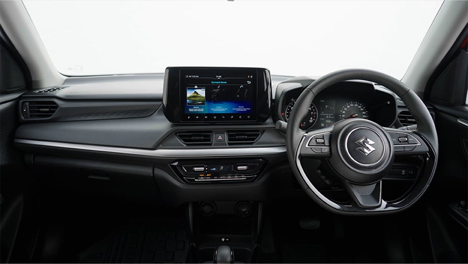 Interior dashboard view of a Maruti Suzuki Swift