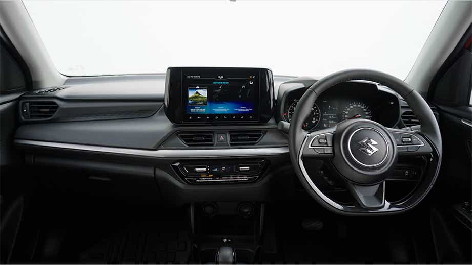 Interior dashboard view of a Maruti Suzuki Swift