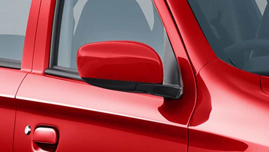 Side mirror close-up of a Maruti Suzuki Alto