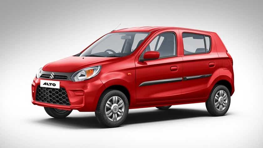 front three-quarter view of a Uptown Red Maruti Suzuki Alto
