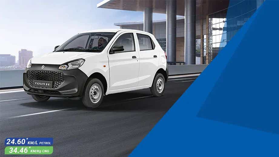 front three-quarter of a Solid White Maruti Suzuki Alto Tour