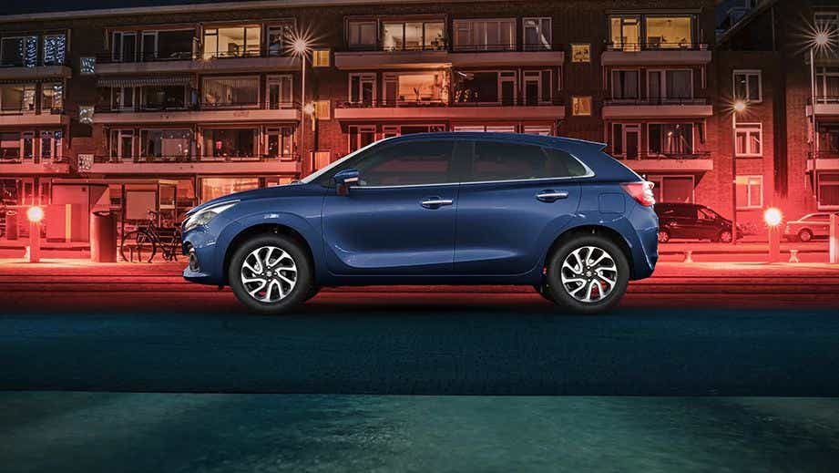 side view of a Nexa Blue Maruti Suzuki Baleno