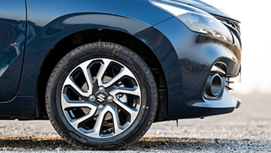Front wheel and bumper of a Maruti Suzuki Baleno