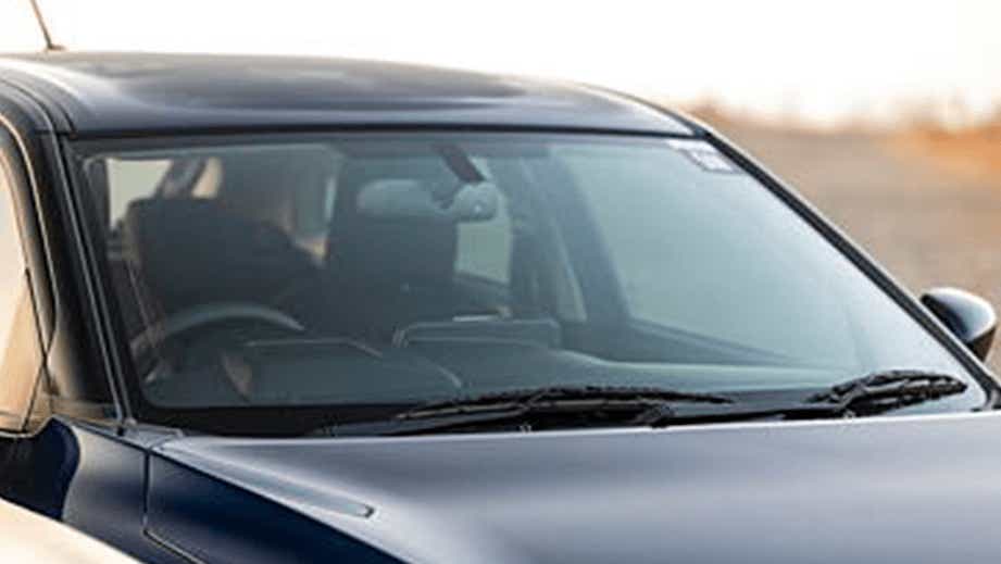 Windshield and front seats of a Maruti Suzuki Baleno