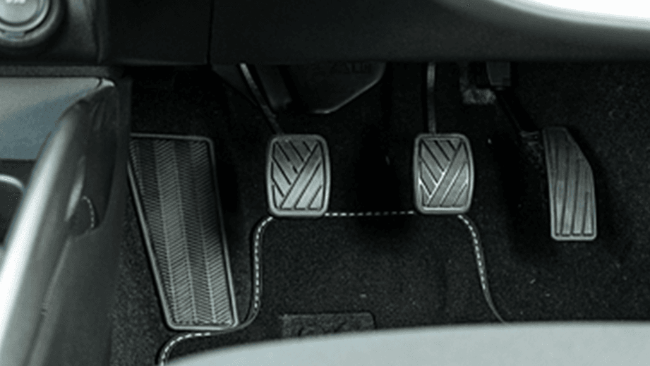 Close-up of the pedal area of a Maruti Suzuki Baleno
