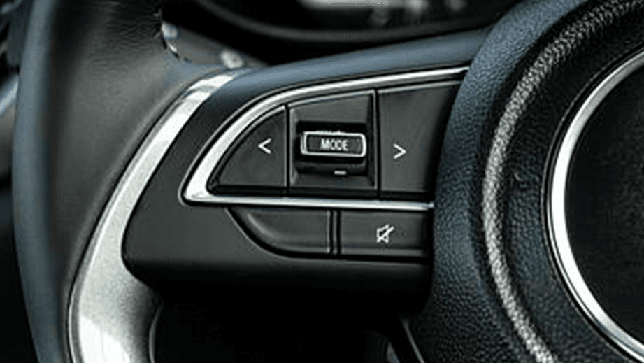 Steering wheel audio controls of a Maruti Suzuki Baleno