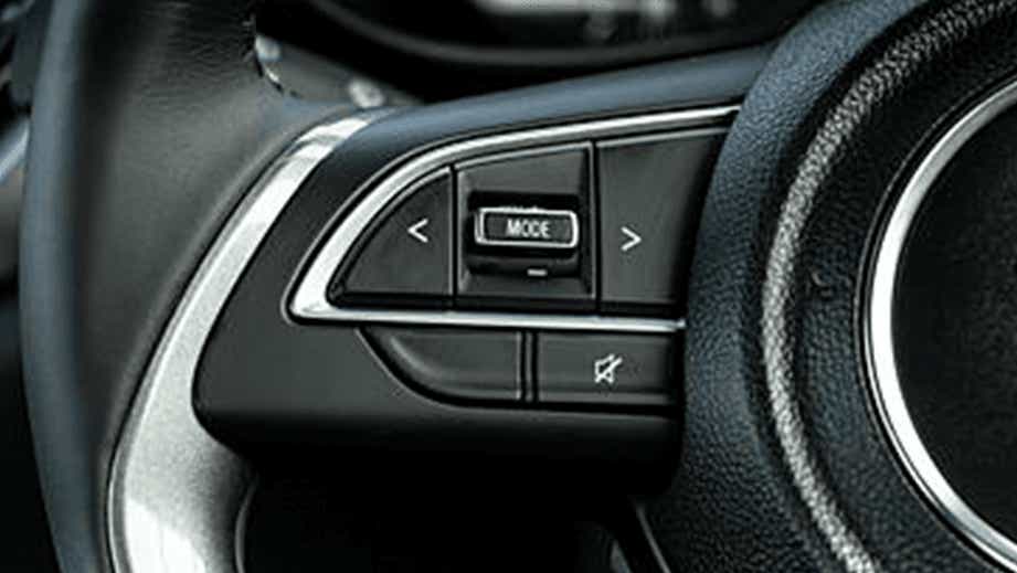 Steering wheel audio controls of a Maruti Suzuki Baleno