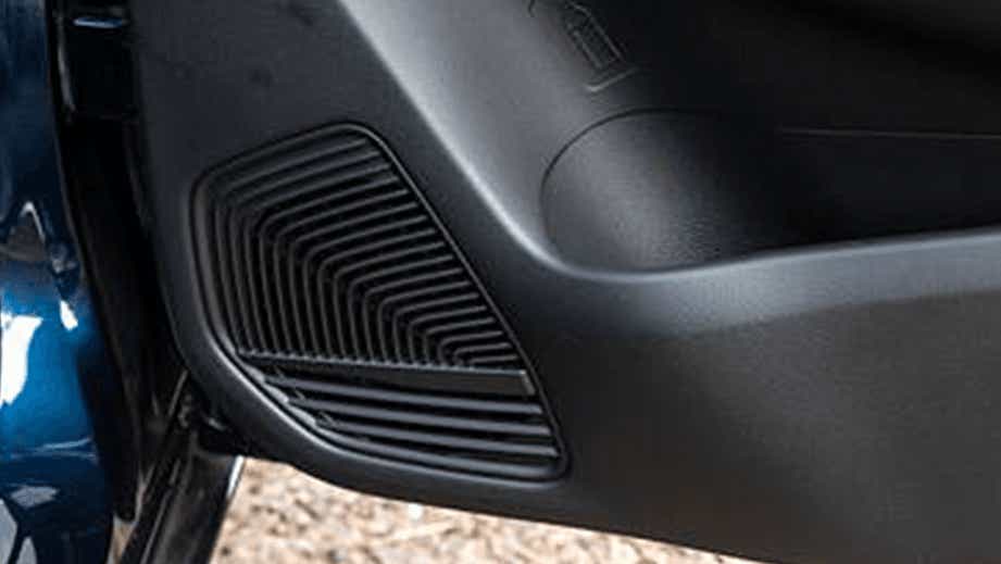 Interior door panel speaker grille of a Maruti Suzuki Baleno