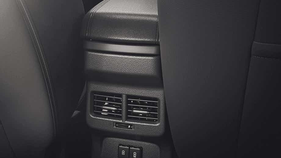 rear AC vents and center console of a Maruti Suzuki Brezza