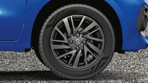 front wheel close-up of a Speedy Blue Maruti Suzuki Celerio
