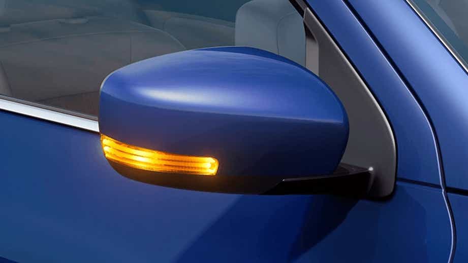 Side mirror with indicator of a Maruti Suzuki Dzire 2018-2023