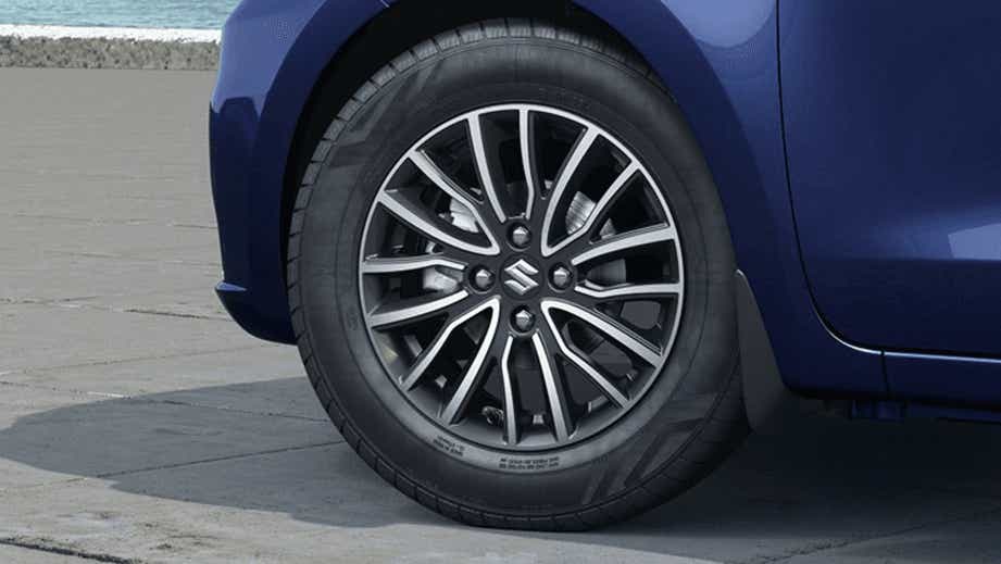 close-up of alloy wheel of a Maruti Suzuki Dzire 2018-2023