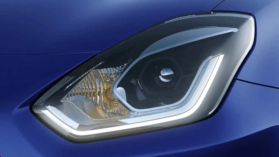headlight close-up of a Maruti Suzuki Dzire 2018-2023