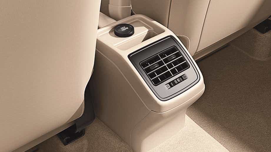 Rear AC vent and power outlet of a Maruti Suzuki Dzire 2018-2023