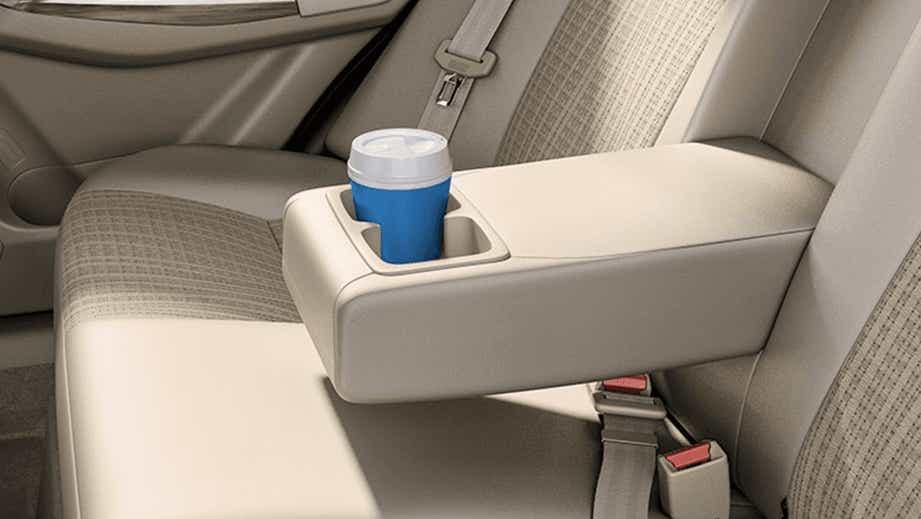 rear seat armrest and cupholder area of a Maruti Suzuki Dzire 2018-2023