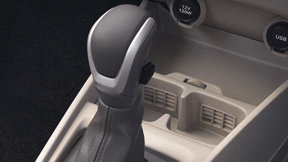 gear shifter and console area of a Maruti Suzuki Ertiga Tour