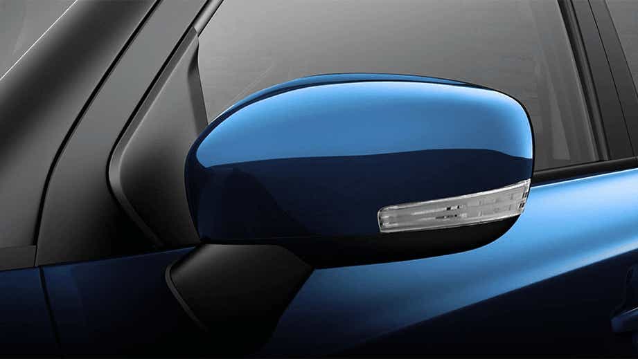 Side mirror close-up of a Nexa Blue Maruti Suzuki Ignis