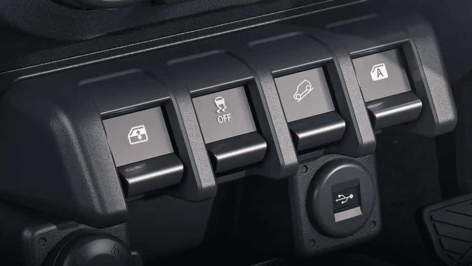close-up of dashboard switches in a Maruti Suzuki Jimny