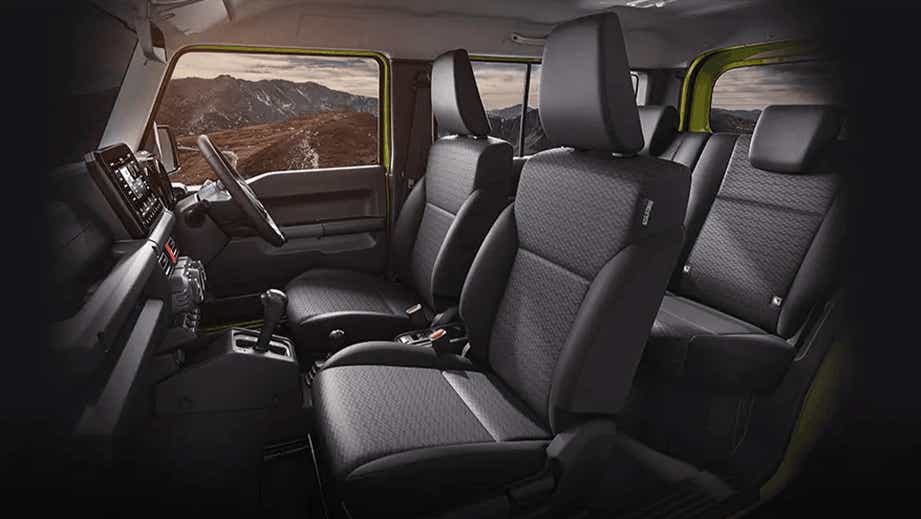 interior front and rear seats of a Maruti Suzuki Jimny