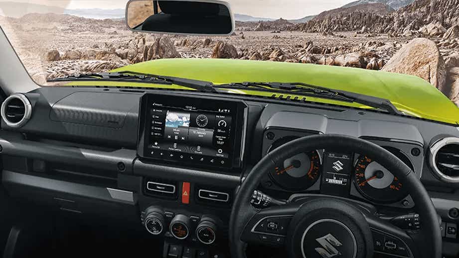 Interior dashboard view of a Maruti Suzuki Jimny