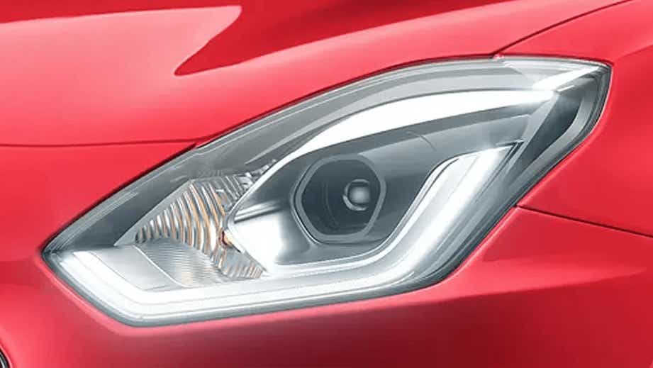 Headlight close-up of a Maruti Suzuki Swift 2021 - 2023