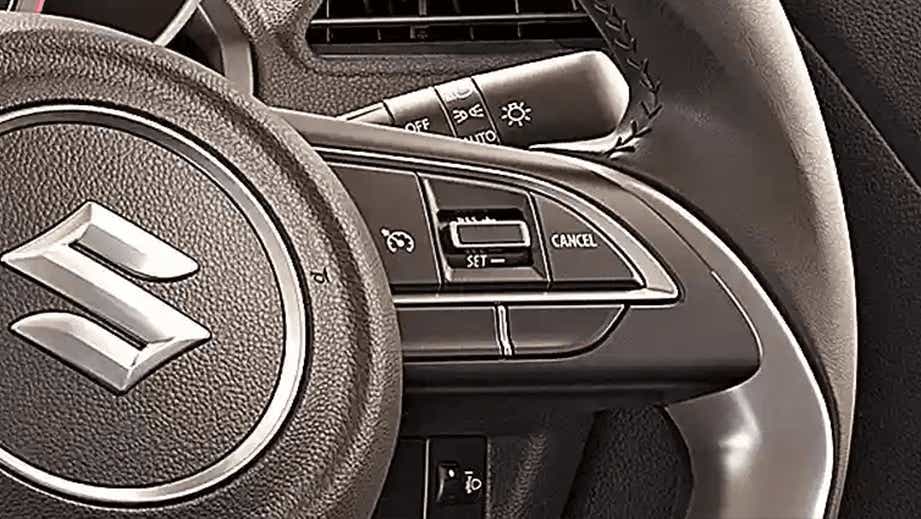 steering wheel controls of a Maruti Suzuki Swift 2021 - 2023