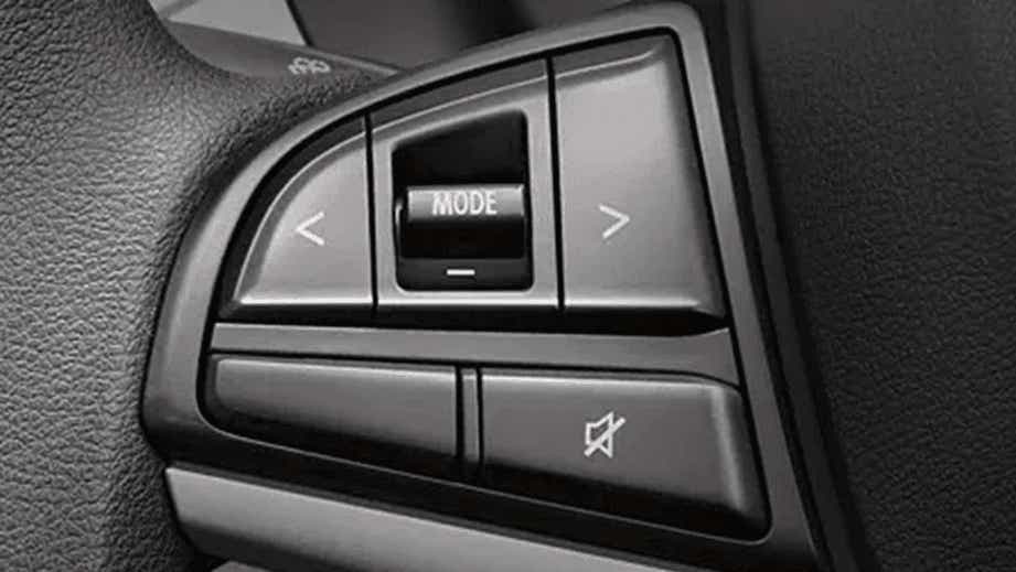 Steering wheel audio controls of a Maruti Suzuki Wagon R