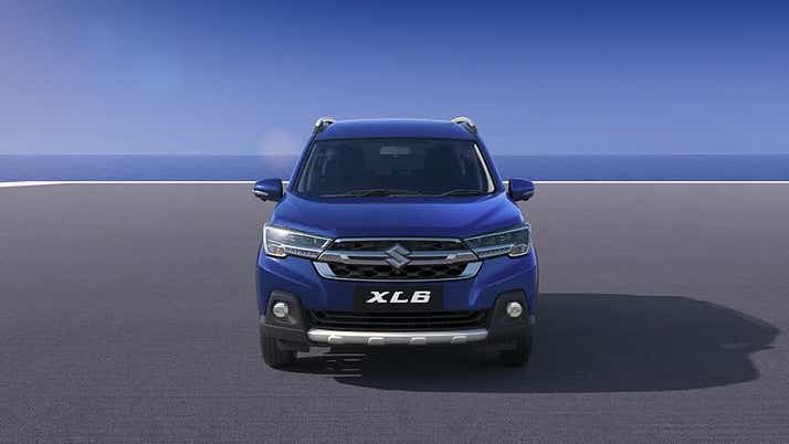 Front view of a Nexa Blue Maruti Suzuki XL6