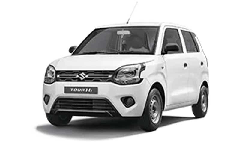front three-quarter view of a Solid White Maruti Suzuki Wagon R tour
