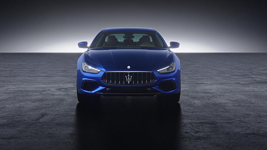 front view of a Blue Emozione Maserati Ghibli