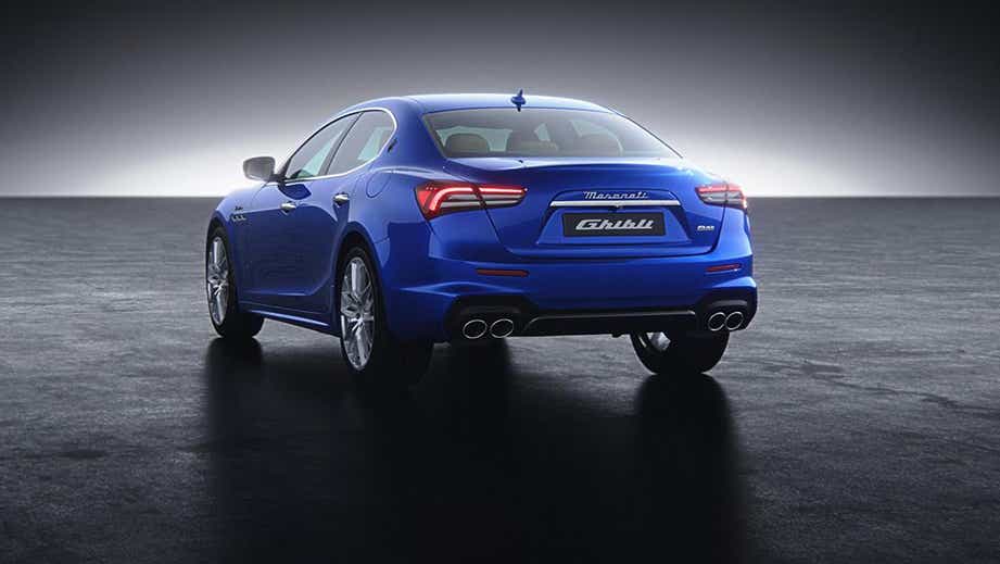 rear three-quarter of a Blue Maserati Ghibli