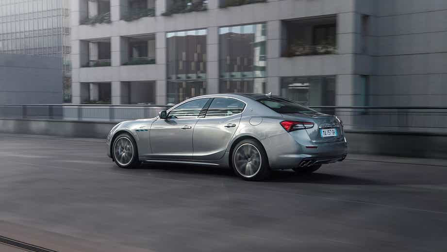 rear three-quarter view of a Maserati Ghibli sedan
