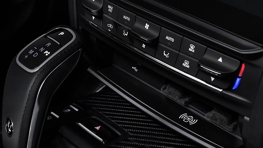 Interior dashboard and center controls of a Maserati Ghibli