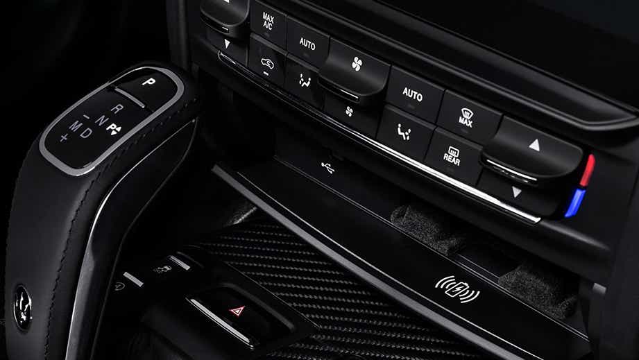Interior dashboard and center controls of a Maserati Ghibli