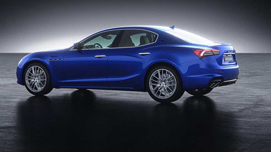 side and rear view of a Blue Emozione Maserati Ghibli