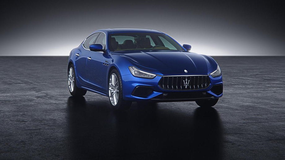 front three-quarter view of a Blue Emozione Maserati Ghibli