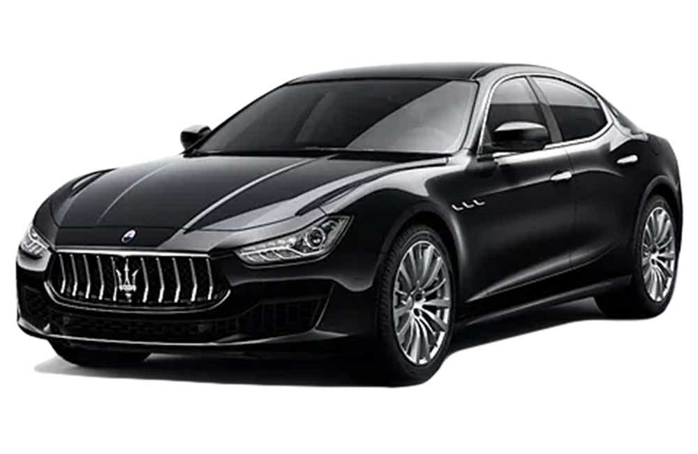 front three-quarter view of a Nero Maserati Ghibli