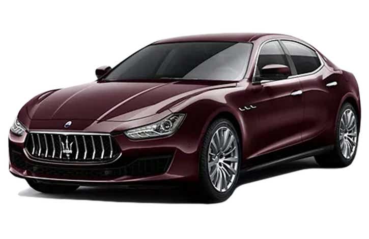 front three-quarter view of a Rosso Folgore Maserati Ghibli