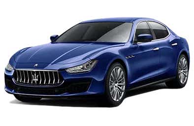 front three-quarter view of a Blue Maserati Ghibli
