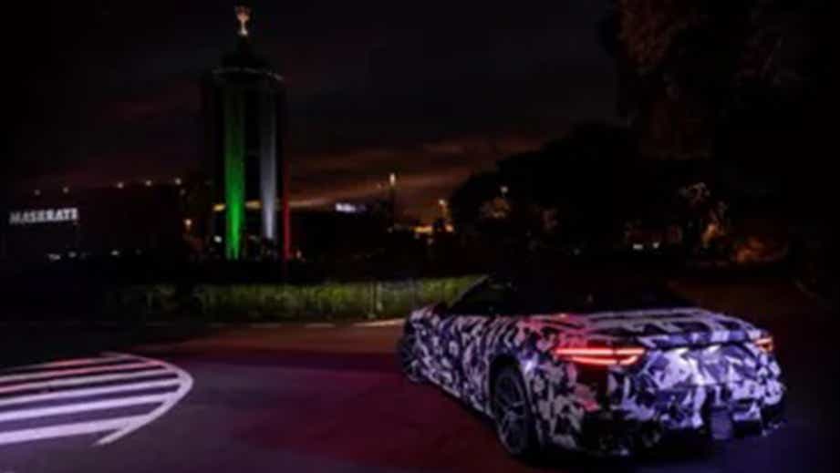 rear view of a Maserati GranCabrio at night