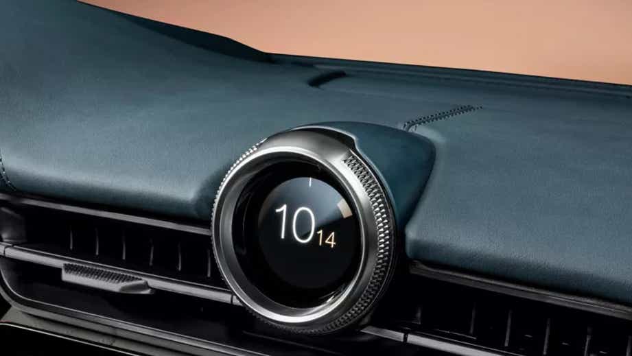 Dashboard clock close-up of a Maserati GranTurismo