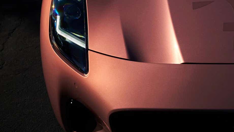 headlight close-up of a Maserati GranTurismo